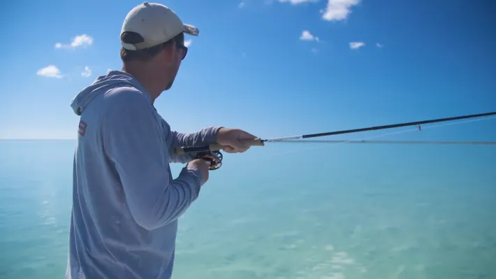 Which fish species are typically caught in Hawaii using fly fishing techniques